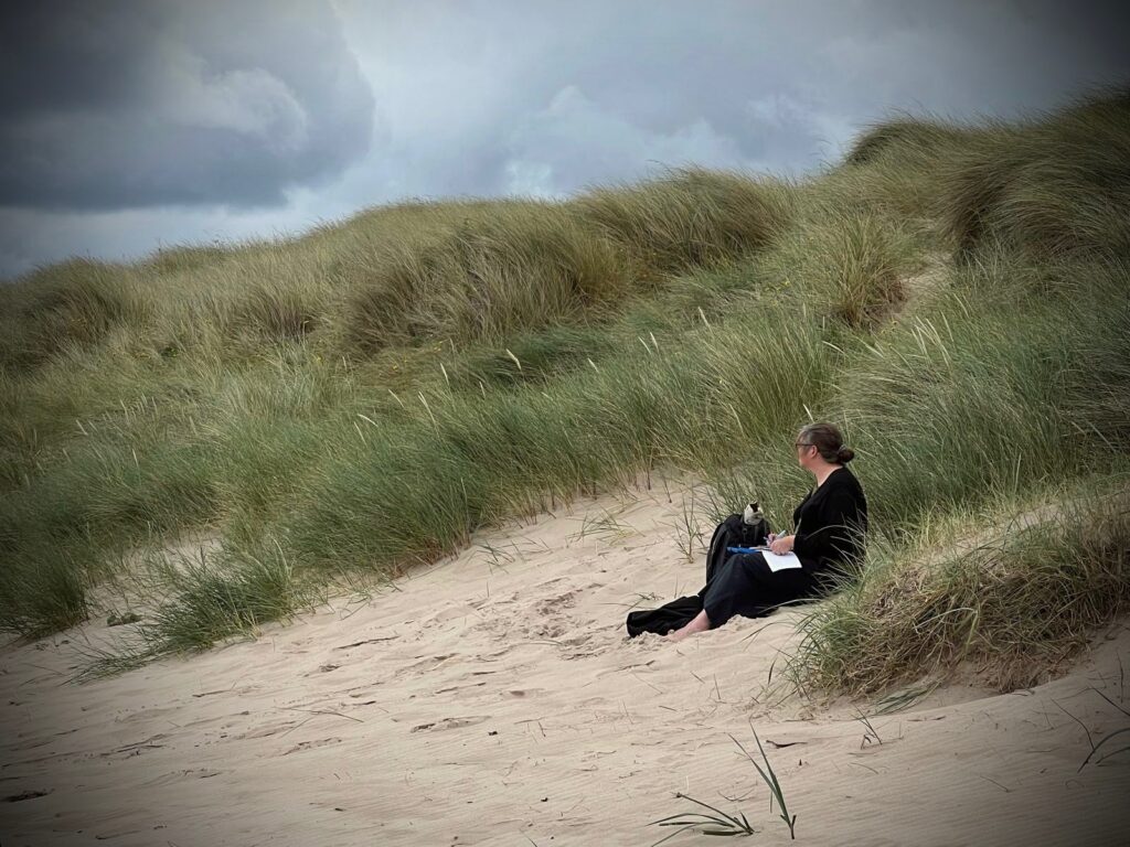 portrait of artist verity James drawing on location